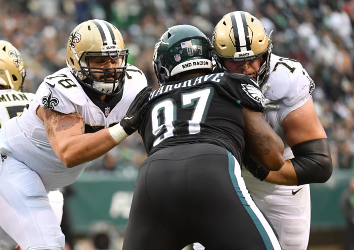 Nov 21, 2021; New Orleans Saints center Erik McCoy (78) and guard Calvin Throckmorton (76) block Philadelphia Eagles defensive tackle Javon Hargrave (97). Mandatory Credit: Eric Hartline-USA TODAY Sports